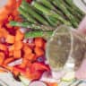 Cover the carrot, asparagus, onion, pepper and green asparagus with herb dressing