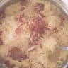 Fried bacon is added to the sauerkraut stew.