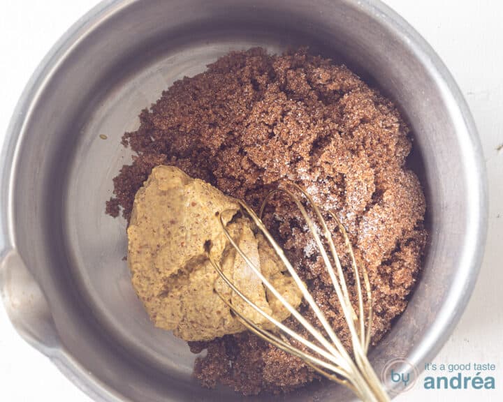 A saucepan with mustard and brown sugar