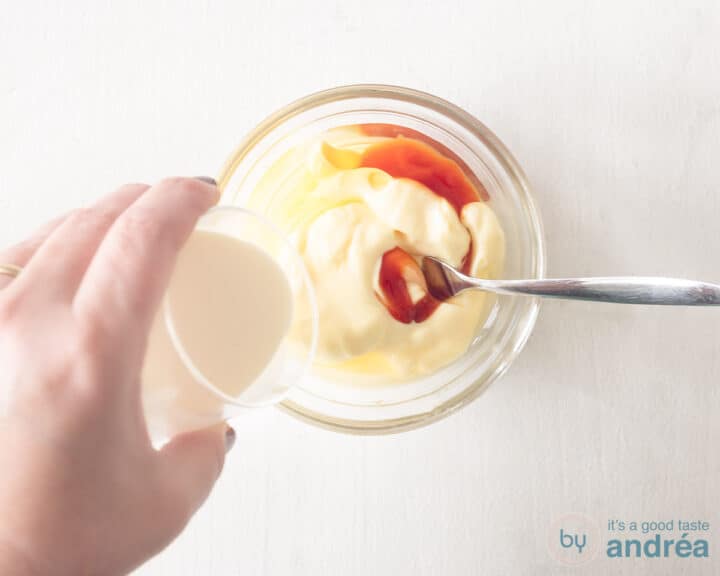 A bowl with ingredients for the whiskey sauce