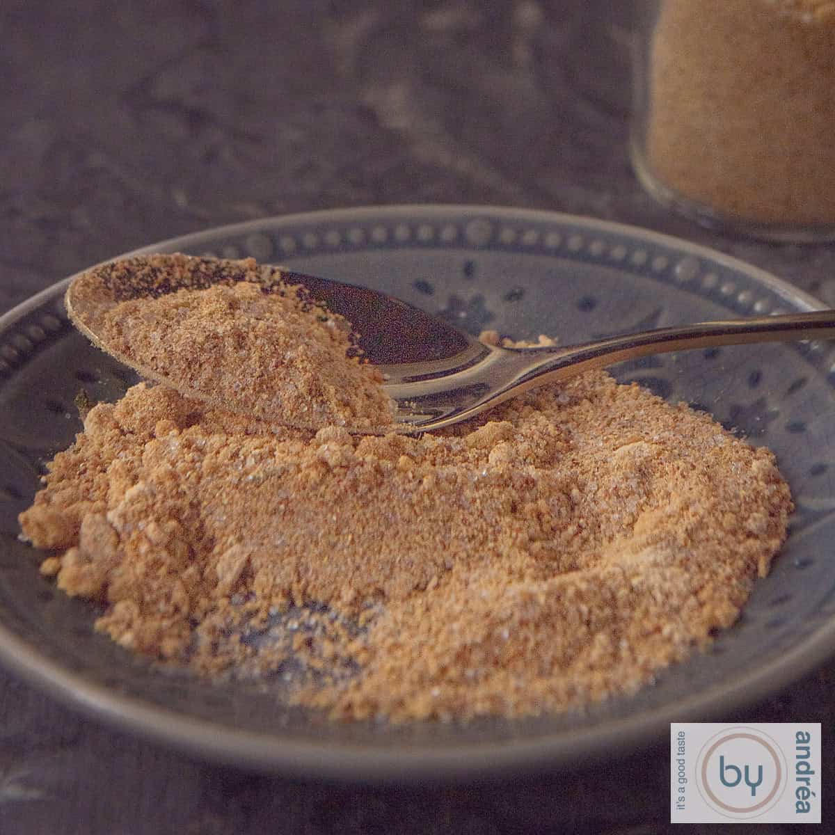 A square photo of a gray plate with babi pangang spice mix that you made yourself.