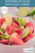 Part of a pink bowl with watermelon, goat cheese, nuts and lime. A text at the top: Easy recipe, watermelon salad with goat cheese