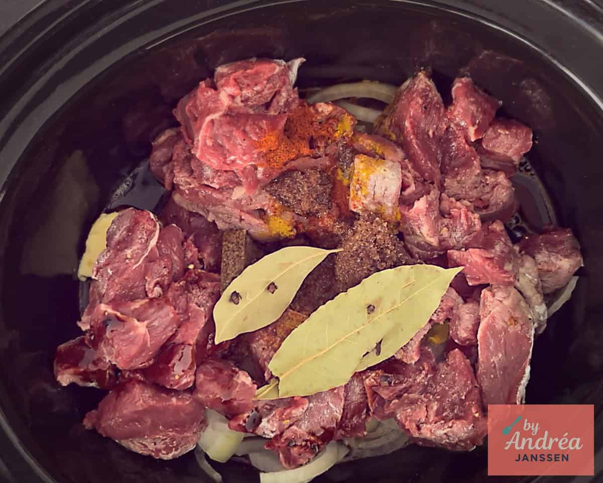 Beef stew with herbs in the slow cooker