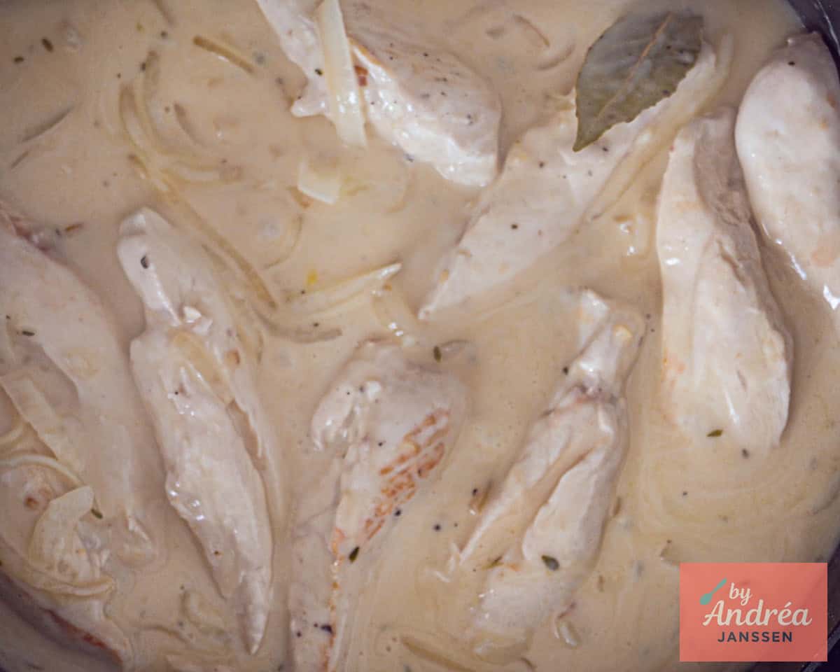 chicken in cream sauce in a pan