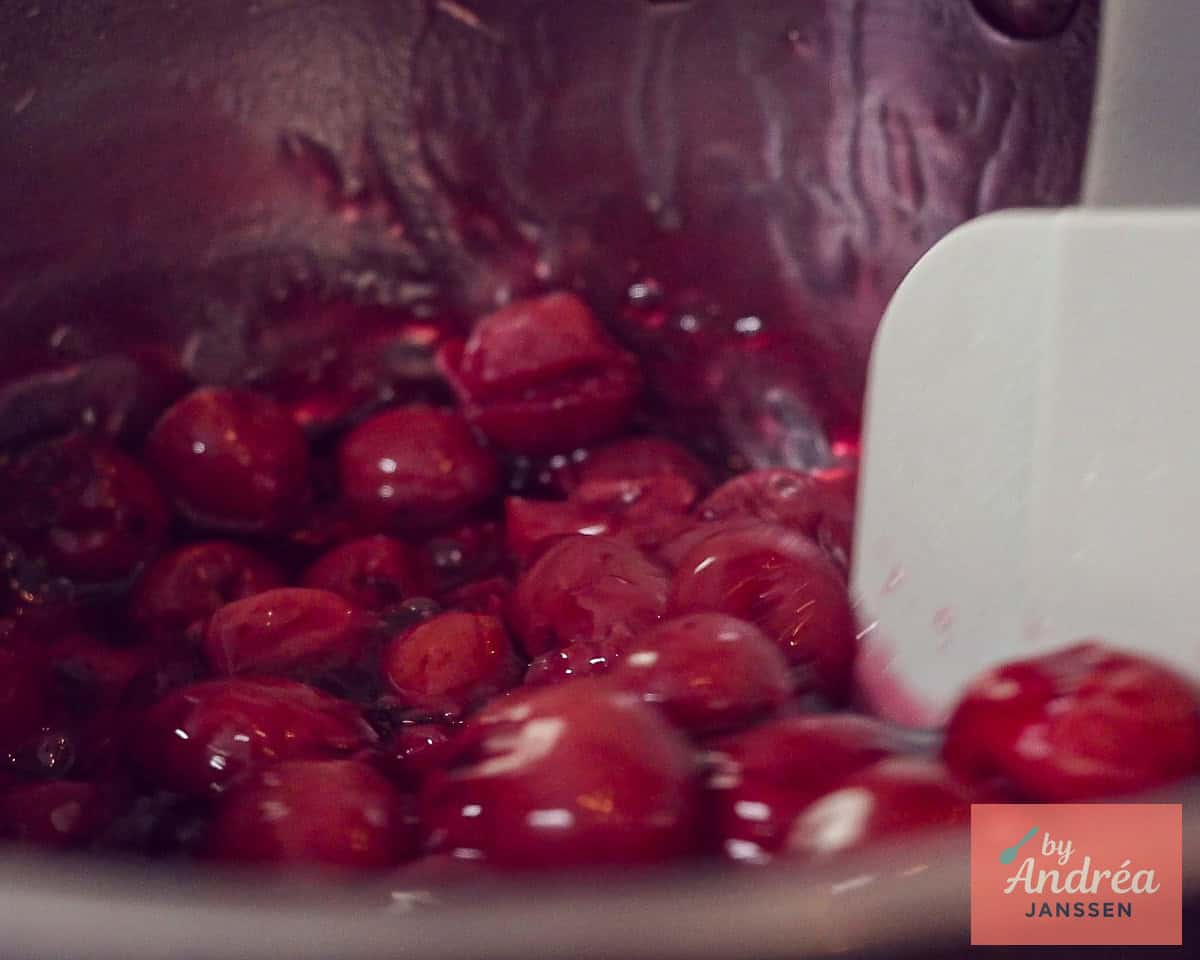 Cherries are added to the pan and stirred