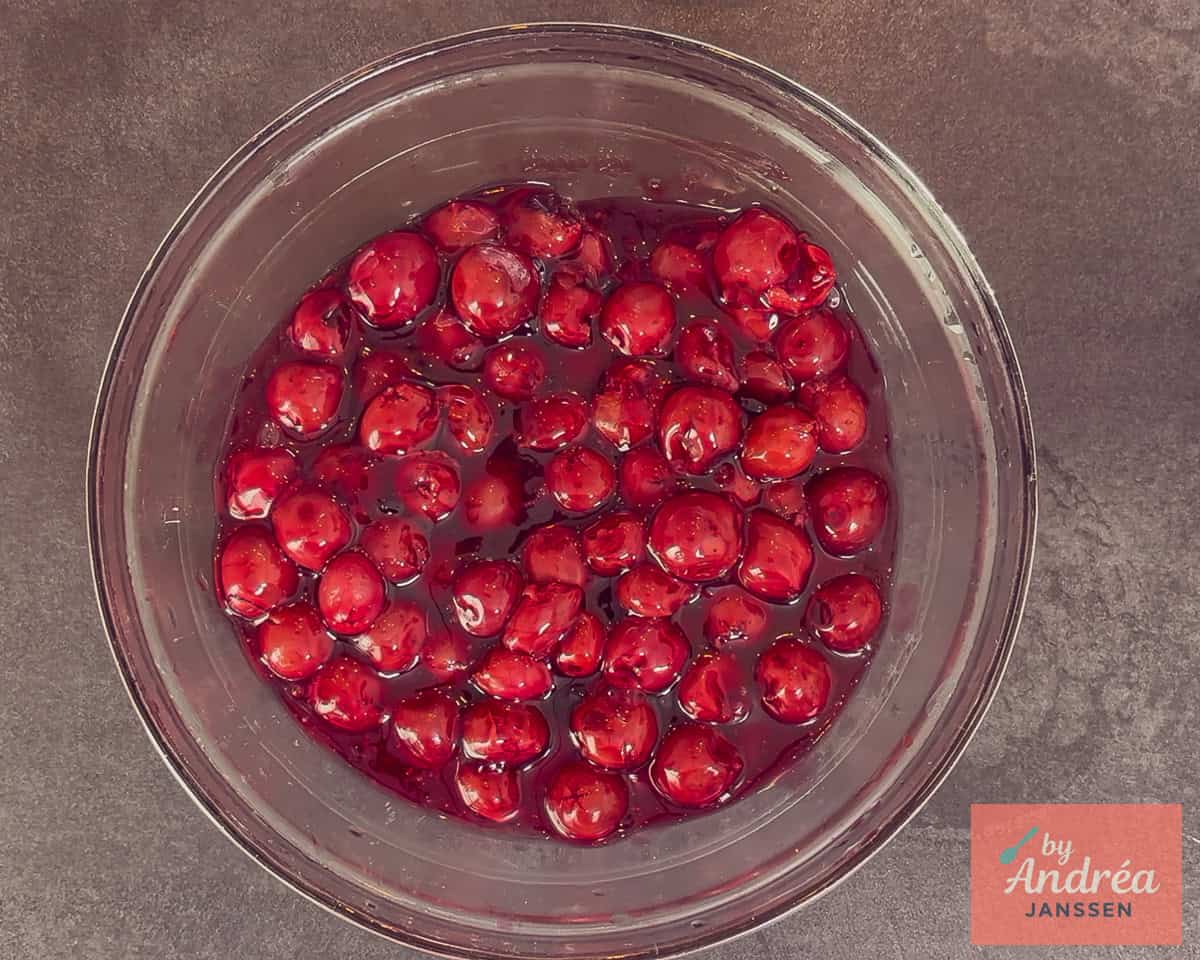 Cherry pie filling in a bowl to cool