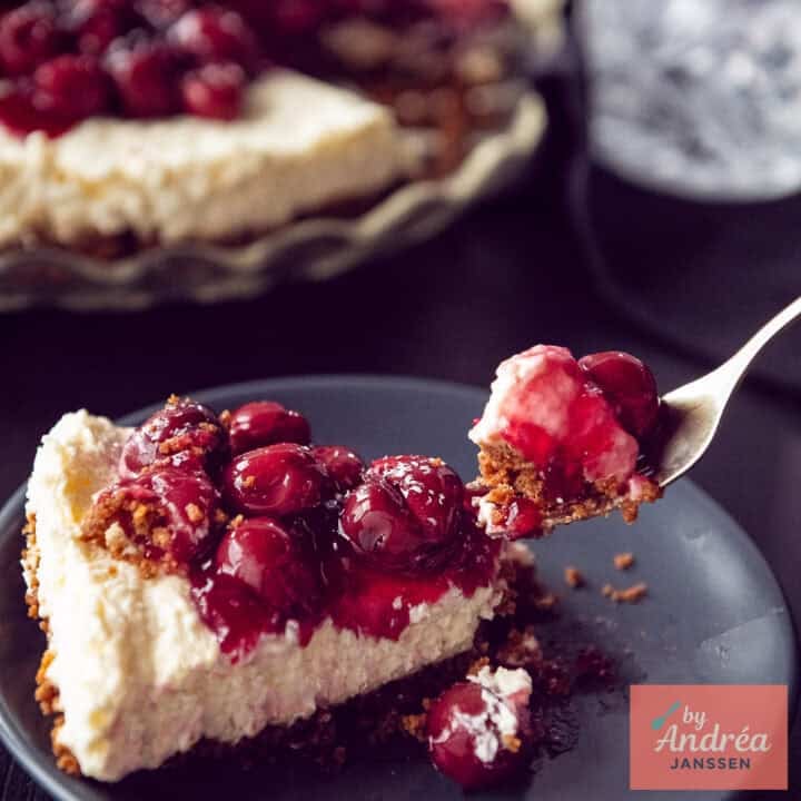 A square photo of a piece of monchou cake with a bite taken off it.