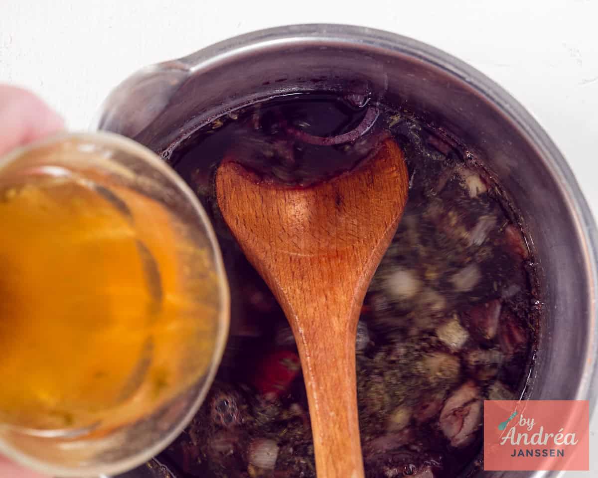 Pour stock into the pan with the sauce