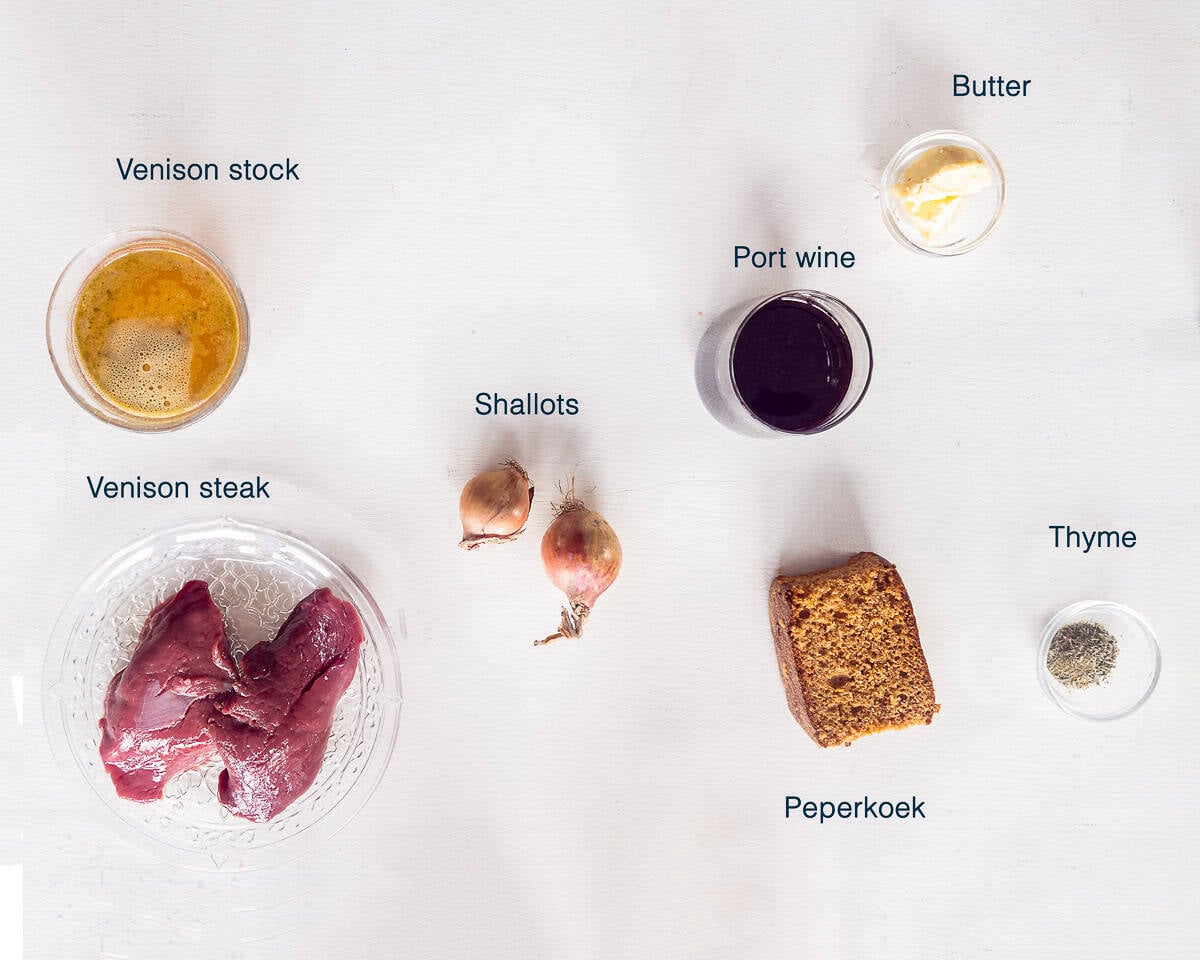 Ingredients Venison Steak With Port Wine Sauce on a white background with text description