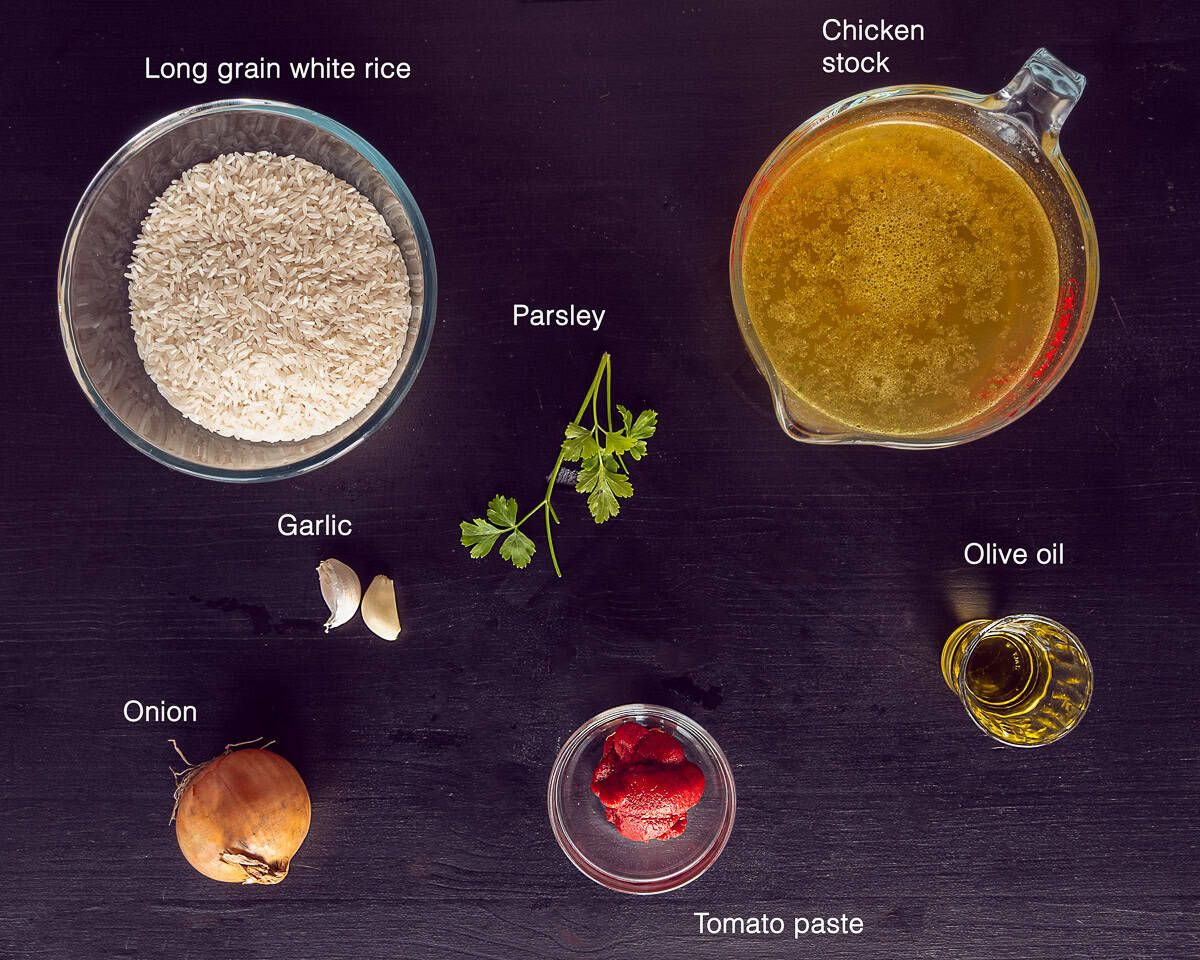 Ingredients Mexican Red Rice Ready In 30 Minutes on a black background with text description