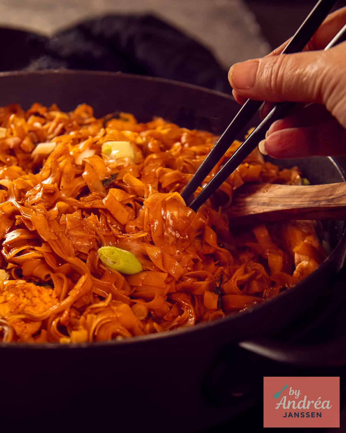 A Pan of Caramel Noodles with Chicken and Egg