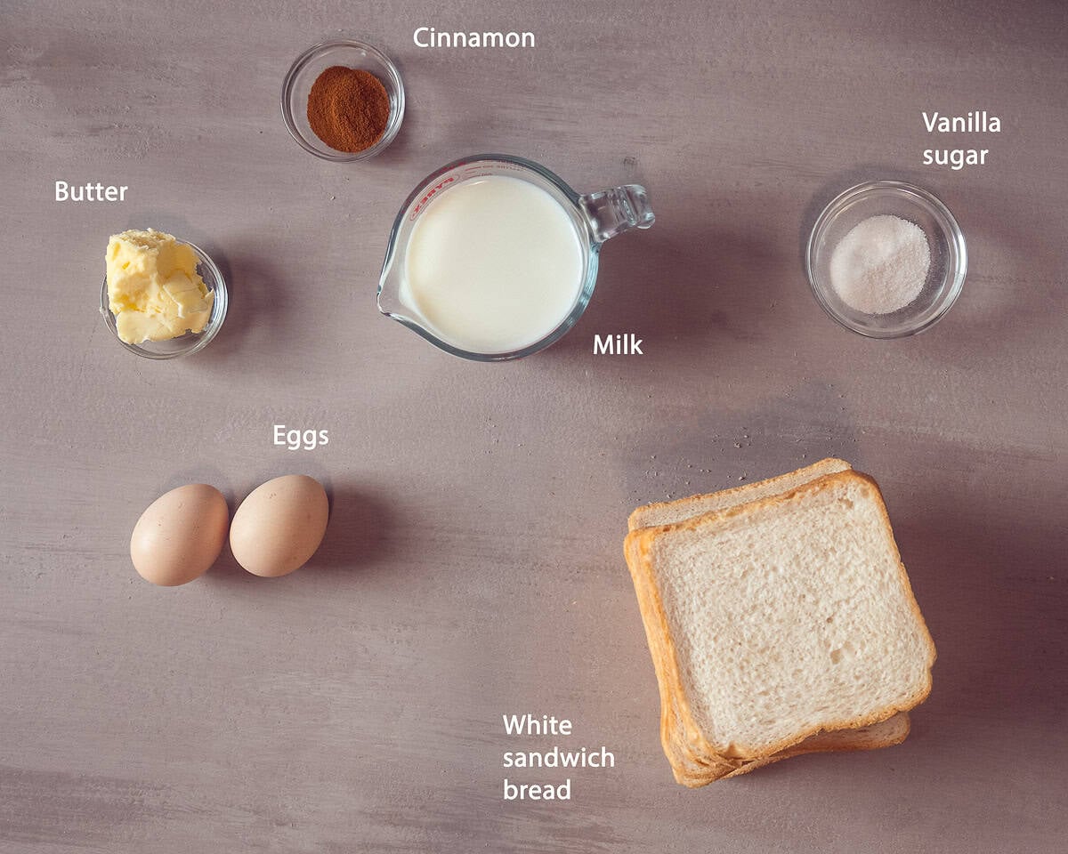 Ingredients Dutch French Toast- Wentelteefjes on a taupe background with text description
