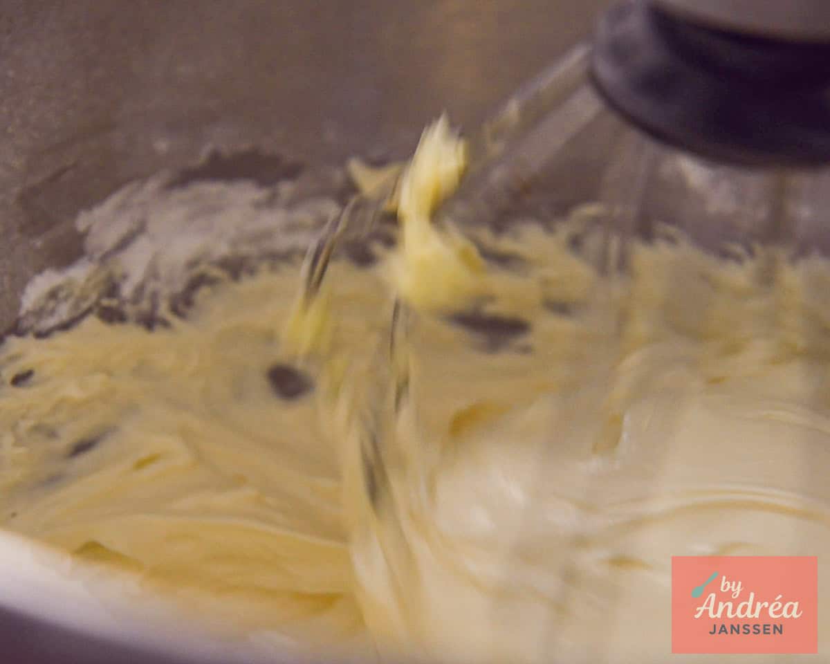 Beat butter, powdered sugar, and vanilla until a light and fluffy mixture.