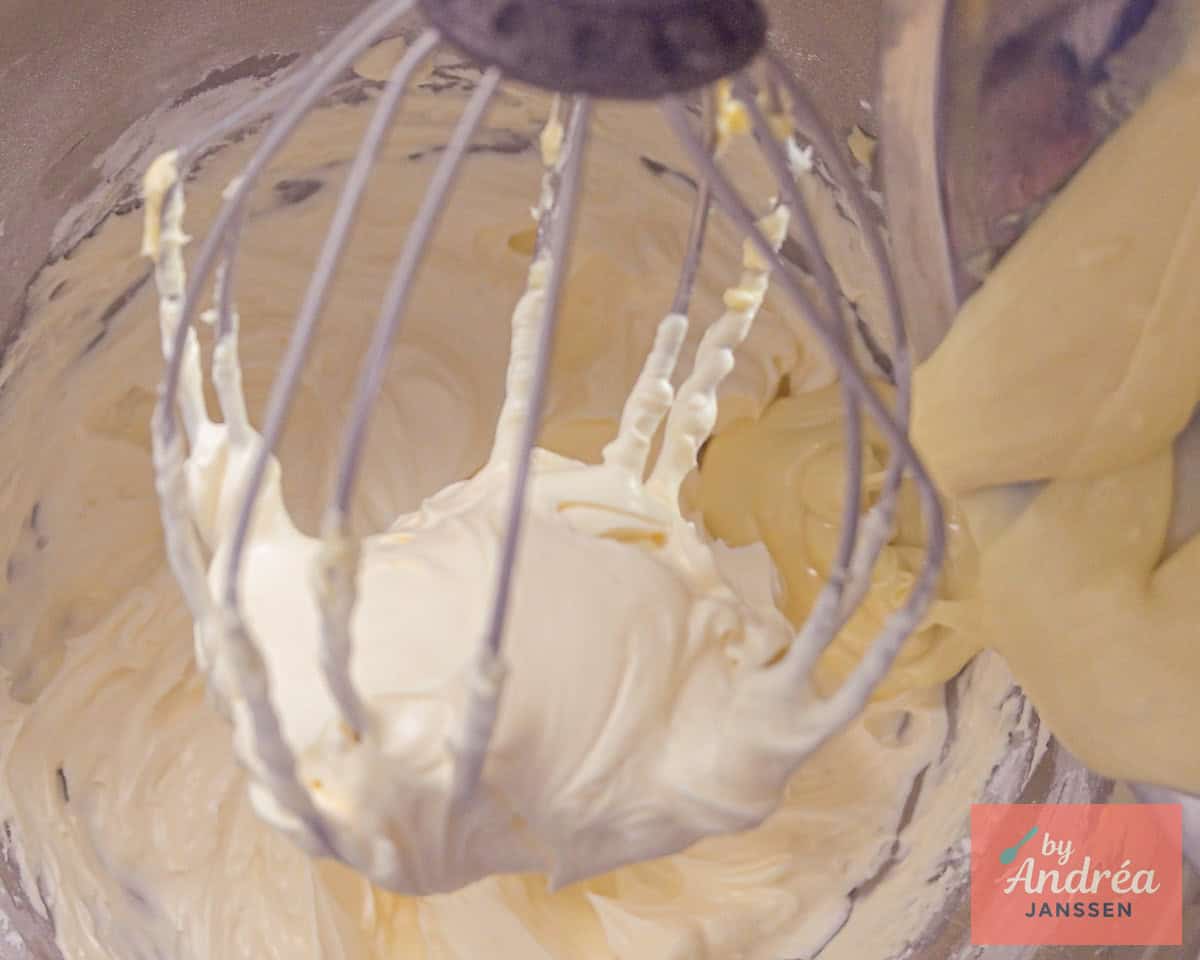Add melted white chocolate to light buttercream