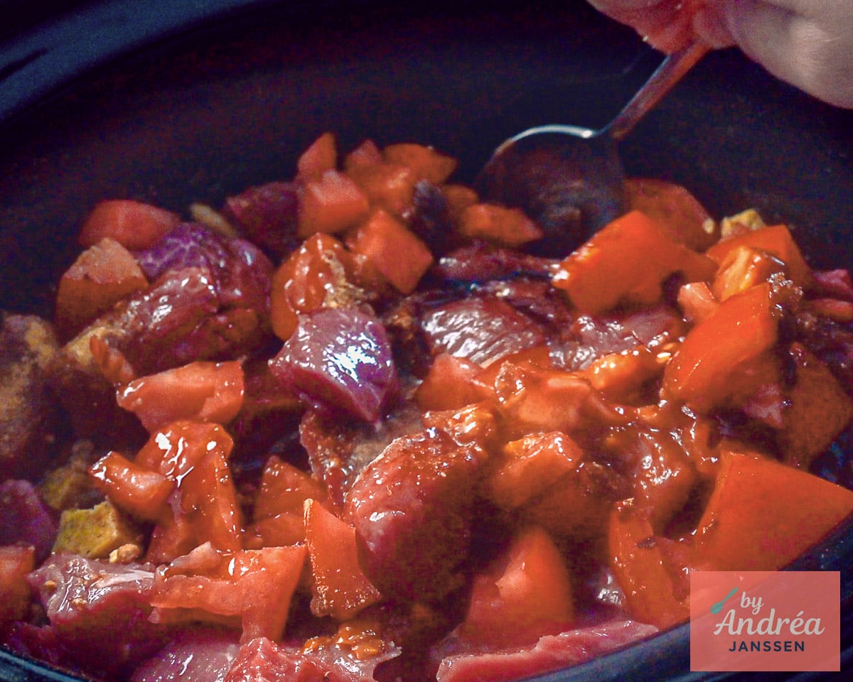 Beef in a slow cooker with sweet soy sauce, spices, and seasonings