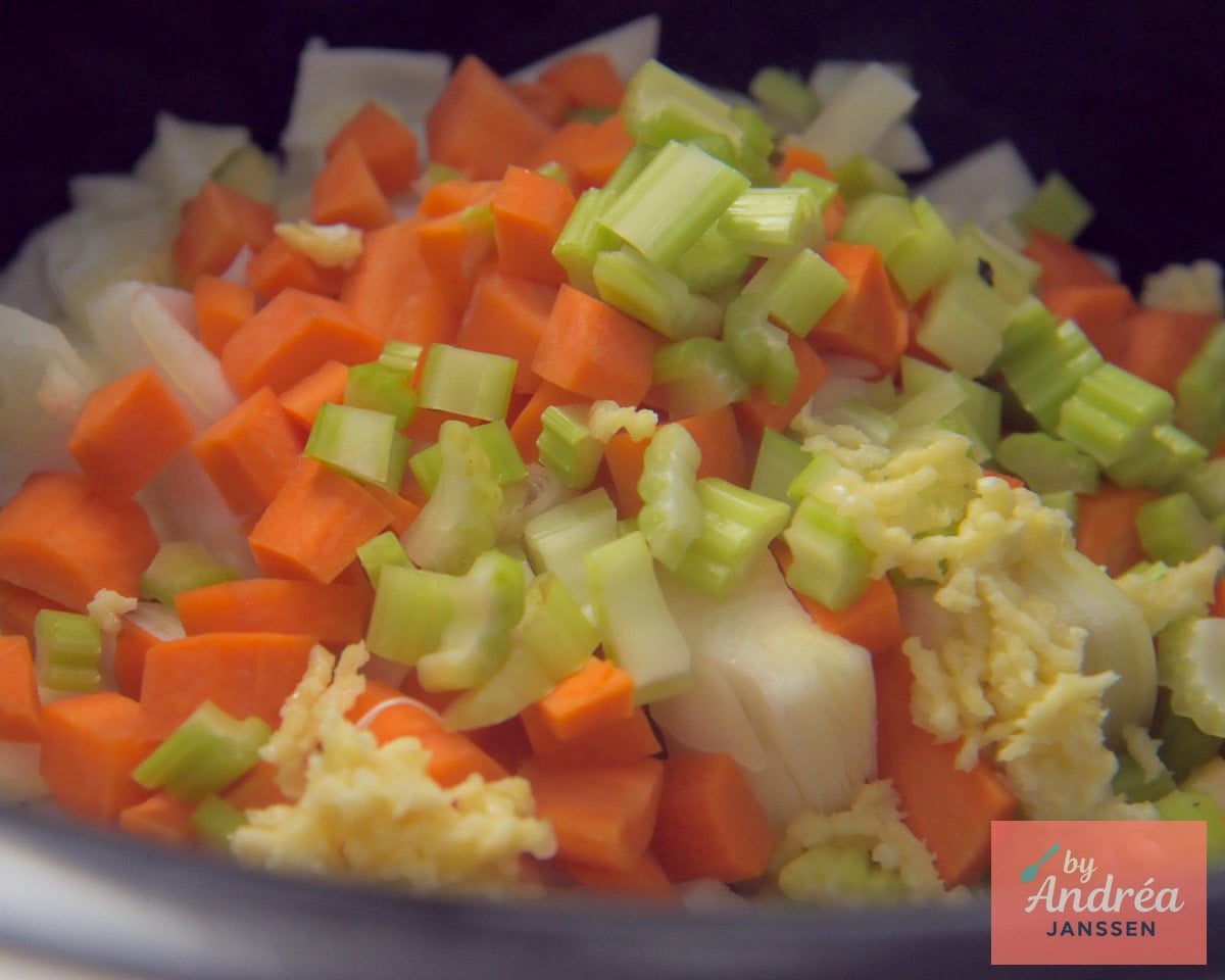 Carrots, celery, onions, and minced garlic form the flavorful base of this slow cooker chili con carne.